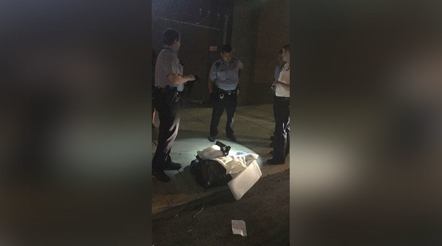 Child-size casket, open, found neighboring Philadelphia cemetery