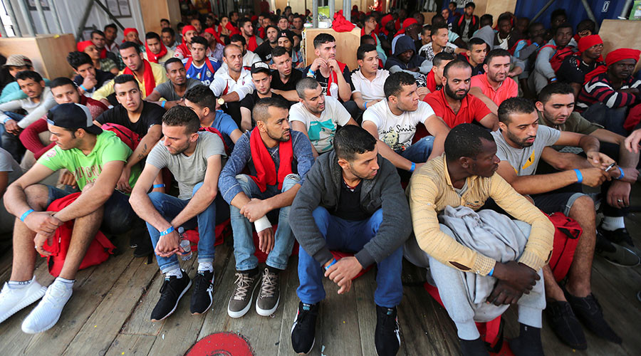 EU asks Britain to take 1,000s more refugees