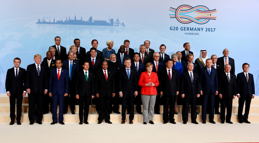 Not so close? Trump further from center than predecessor Obama for G20 family photo