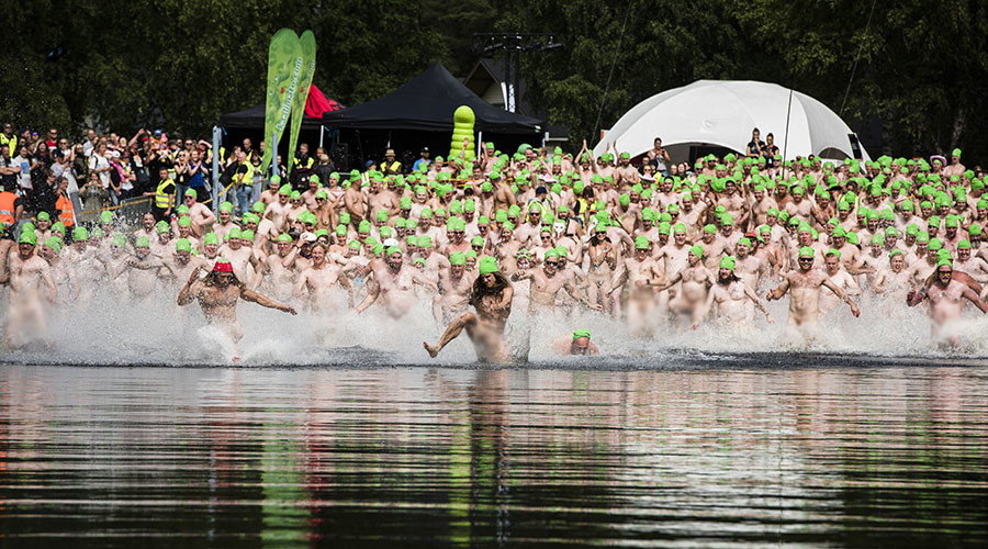 Mass naked swim breaks skinny dipping world record (PHOTOS)