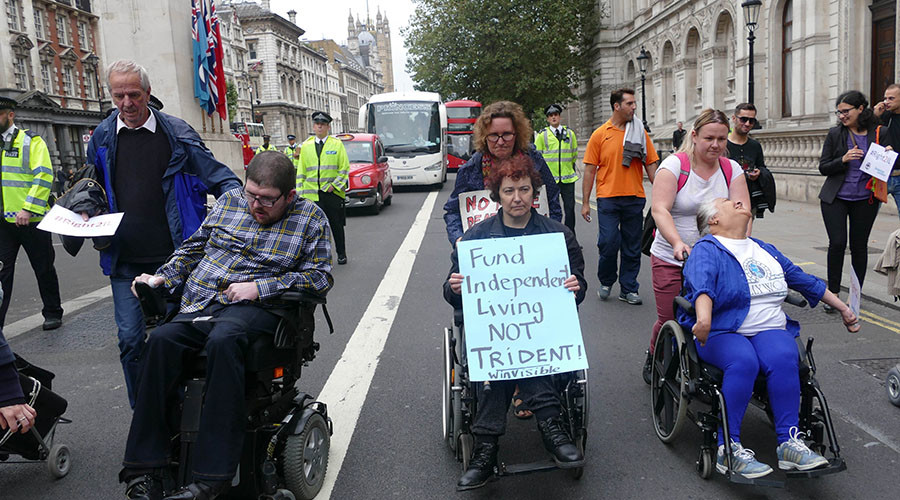 Protesters in wheelchairs block MPs’ entrance to Parliament