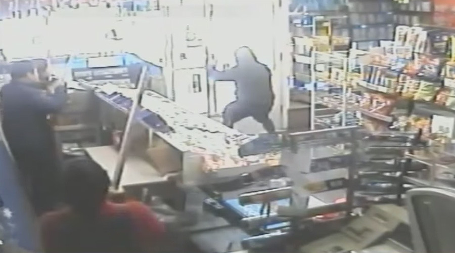 Armed shopkeepers chase attempted robber out of store (VIDEO)