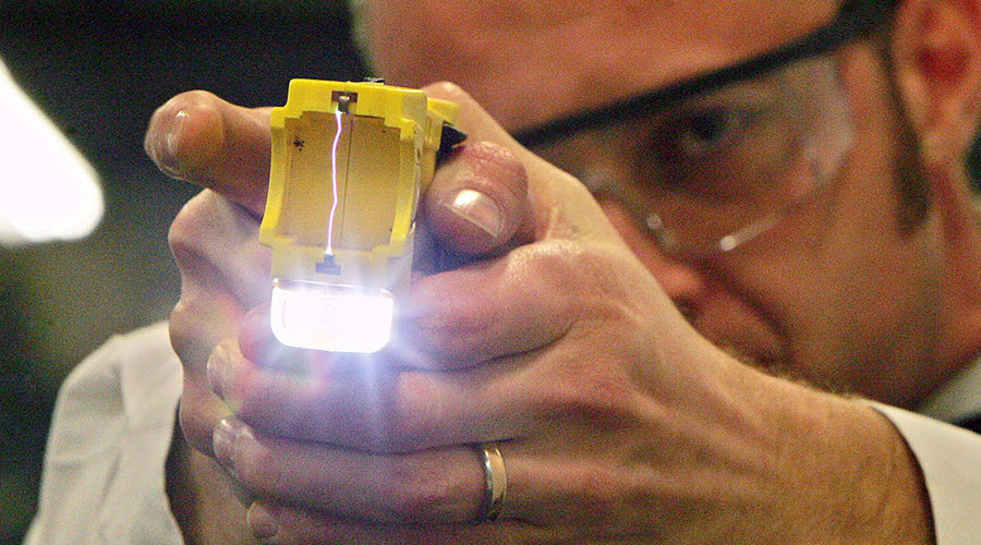 Armed police taser man carrying crossbow & knife through central Manchester (VIDEO)