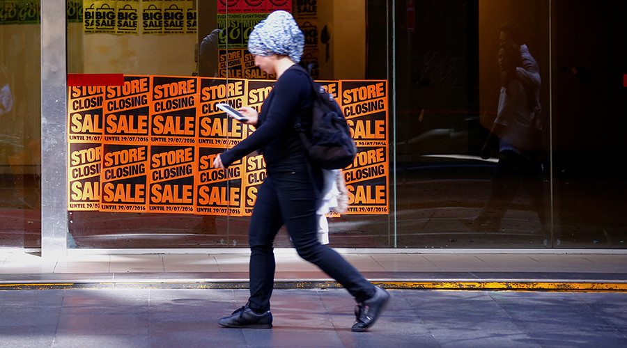 ‘Smartphone zombies’ face bans of up to $99 for texting while crossing the street