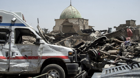 A general view of destroyed vehicles in the vicinity of Al-Nuri Mosque in the Old City of Mosul © Fadel Senna