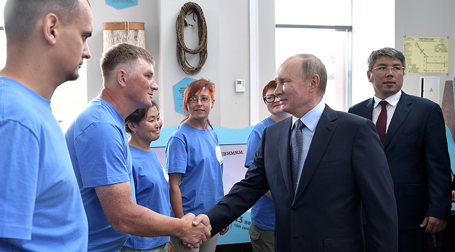 Putin gives first public indication of 2018 presidential run