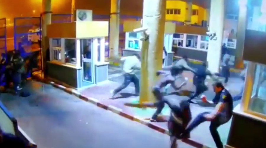 Spanish border guard suffers horrific leg break tackling migrant (VIDEO)