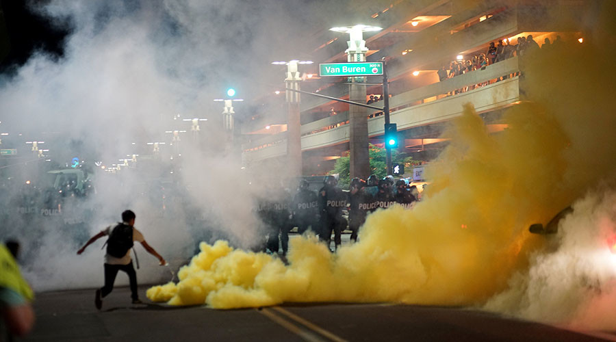 Police fire tear gas at anti-Trump protesters after POTUS holds Phoenix rally