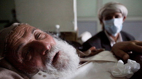 FILE PHOTO: An old man infected with cholera lies on the bed at a hospital in Sanaa, Yemen © Mohamed al-Sayaghi