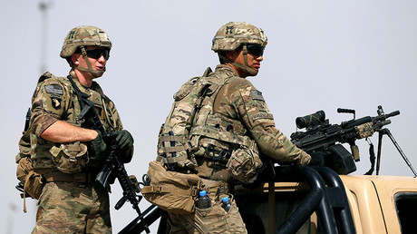 U.S. troops keep watch on the back of a truck outside their base in Uruzgan province, Afghanistan July 7, 2017 © Omar Sobhani