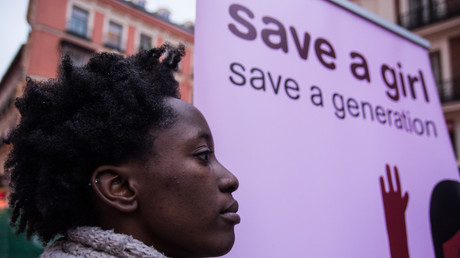 A woman protesting in Madrid, Spain, during the International Day against female genital mutilation. © Pacific Press / Getty