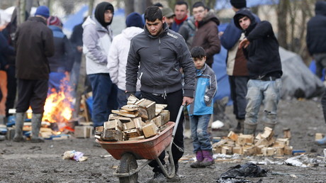 FILE PHOTO A camp of makeshift shelters for migrants and asylum-seekers near Calais, France. © Yves Herman