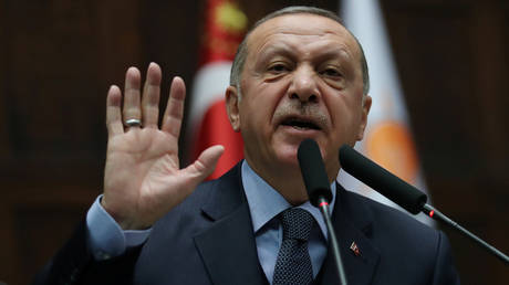Turkish President Tayyip Erdogan addresses members of parliament from his ruling AK Party (AKP) in Ankara, Turkey on January 8, 2019. 