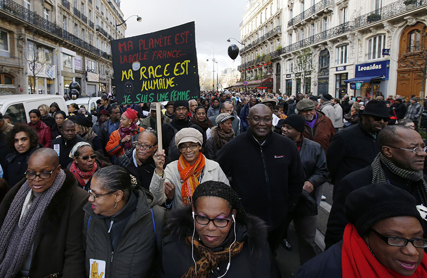 'We are the children of immigrants': Paris marches against 
