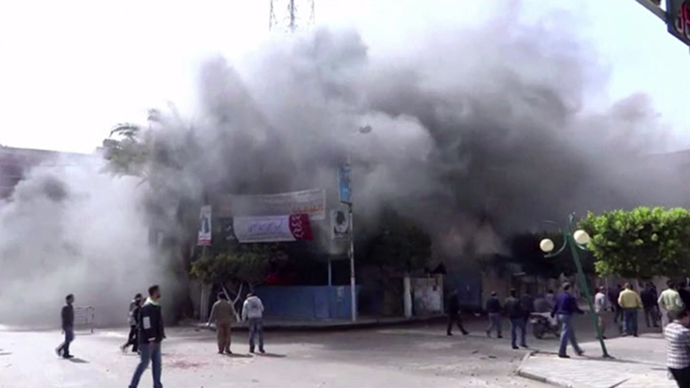 John Kerry visits Egypt as dozens injured in violent protests