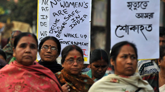 Indian protesters shout slogans as they take part in a protest rally in Siliguri on December 29, 2012, after the death of a gangrape victim from the Indian capital New Delhi. AFP Photo / Diptendu Dutta
