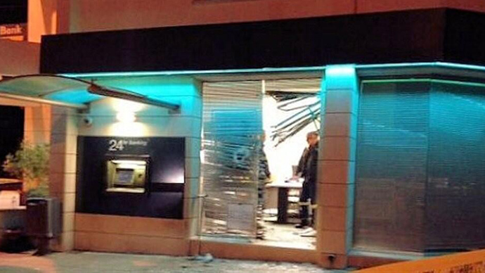 Small blast hits ATM in Cyprus ahead of bailout deal