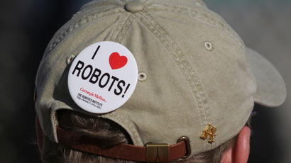 A robotics fan wears a button on his hat at the Defense Advanced Research Projects Agency (DARPA) Grand Challenge in Primm Nevada. (Reuters / Gene Blevins)