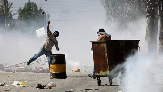 IDF teargas Palestinian youth protesting ruthless beating