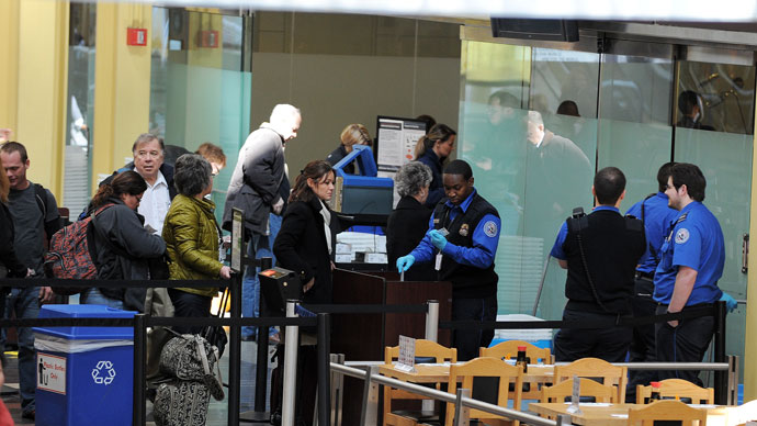 Transportation Security Administration (TSA) personnel work at the Ronald Reagan National Airport in Washington, DC.(AFP Photo / Jewel Samad)