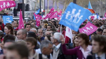 Demonstrators opposed to same-sex marriage protest on April 23, 2013 in Paris after the French national assembly adopted a bill legalising same-sex marriages and adoption for gay couples, defying months of opposition protests.  (AFP Photo)