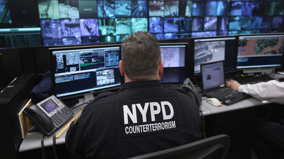 Police and private security personel monitor security cameras at the Lower Manhattan Security Initiative on April 23, 2013 in New York City. (AFP Photo / John Moore)