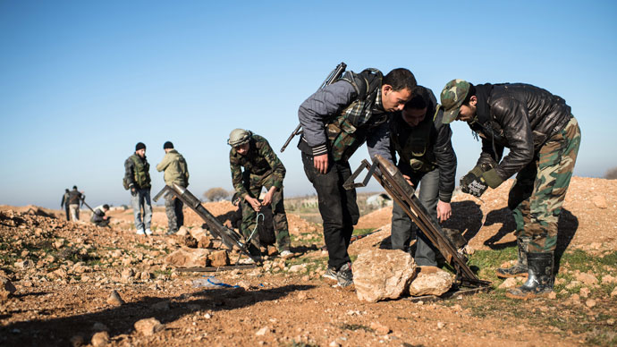 Rebels accuse Assad of large scale massacre after US speaks of arming opposition