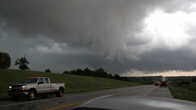 Dozen tornadoes hit already damaged Mid-west, killing one
