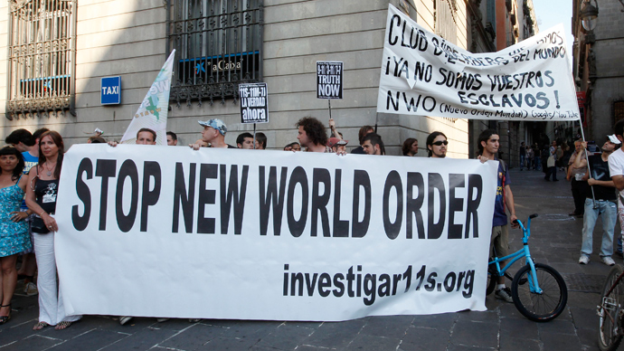 People protest against the Bilderberg meeting in central Barcelona (Reuters / Gustau Nacarino)