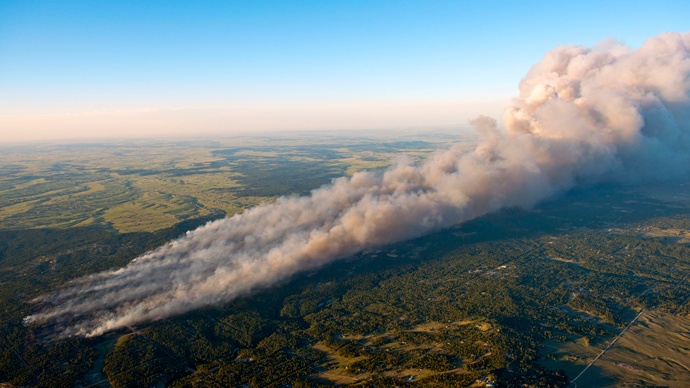 Two dead, tens of thousands evacuated as worst fire in Colorado history spreads