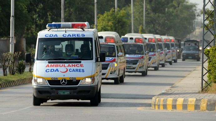 Pakistani militants kill 9 tourists and their guide in hotel shooting