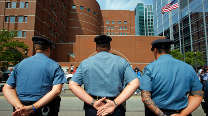 Massachusetts Institute of Technology (MIT) police officers stand outside the federal courthouse for the court appearance by accused Boston Marathon bomber Dzhokhar Tsarnaev in Boston, Massachusetts July 10, 2013 (Reuters / Brian Snyder)