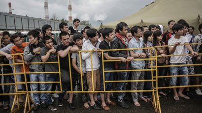 Immigrants in a temporary camp in Golyanovo.(RIA Novosti / Andrey Stenin)