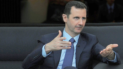 A handout picture released by the Syrian Arab News Agency (SANA) on August 26, 2013 shows Syrian President Bashar al-Assad giving an interview with Russian newspaper Izvestia in Damascus (AFP Photo)