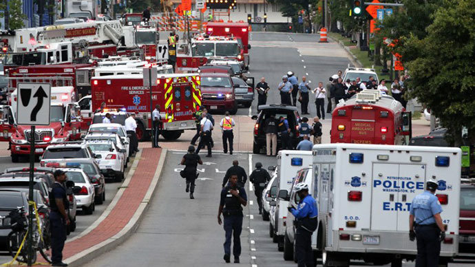 Emergency vehicles and law enforcement personnel respond to a reported shooting at an entrance to the Washington Navy Yard September 16, 2013 in Washington, DC. (AFP Photo / Alex Wong)