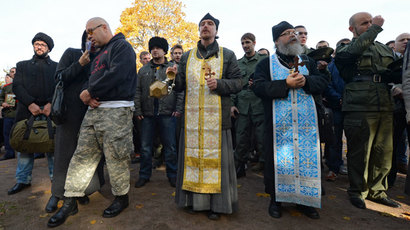 Anti-gay activists protest a planned LGBT event in St. Petersburg.(RIA Novosti / Alexei Danichev)