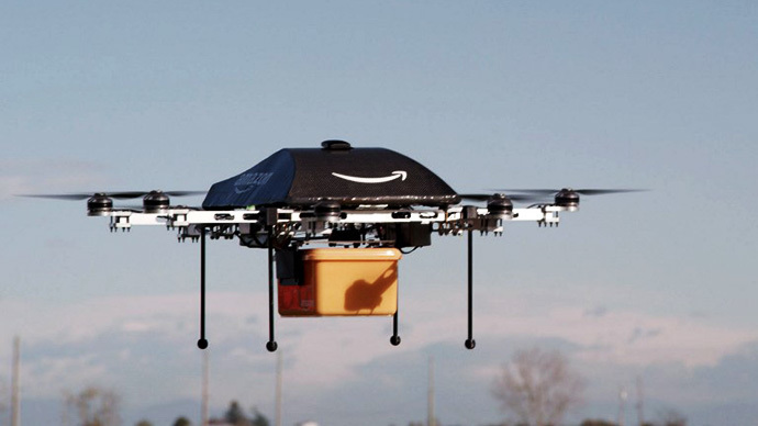 This undated handout photo released by Amazon on December 1, 2013 shows a flying "octocopter" mini-drone that would be used to fly small packages to consumers. (AFP Photo / Amazon)