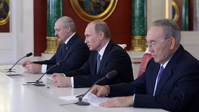 Presidents Vladimir Putin (center) of Russia , Alexander Lukashenko (left) of Belarus and Nursultan Nazarbayev (right) of Kazakhstan making a statement for the press after the end of the Supreme Eurasian Economic Council meeting in the Kremlin on December 24, 2013. (RIA Novosti / Aleksey Nikolskyi)