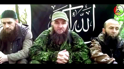 This screen grab taken from undated video posted on July 3, 2013, on the Islamist rebel mouthpiece kavkazcenter.com shows a man identified as Russia's top Islamist leader Doku Umarov (C) recording his appeal in an undisclosed location. (AFP/kavkazcenter.com)