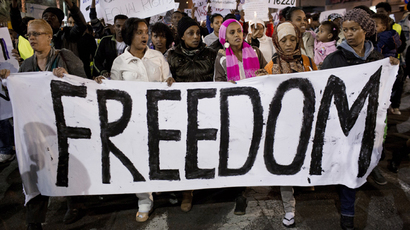 Several thousand African asylum seekers who entered Israel illegally via Egypt stage a peaceful protest in Tel Aviv on December 28, 2013 (AFP Photo / Oren Ziv)