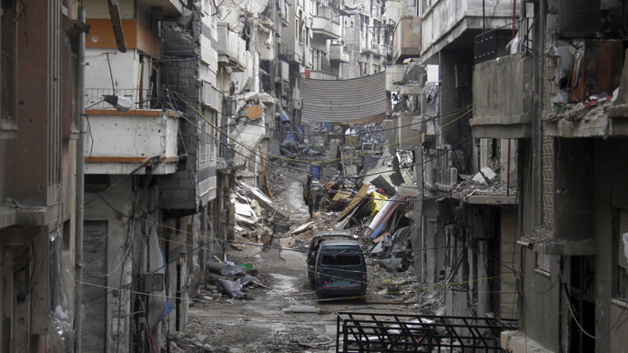 A view of a damaged street in the besieged area of Homs January 4, 2014. (Reuters/Thaer Al Khalidiya)
