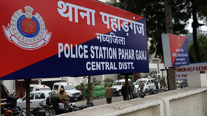 A sign for the Pahar Ganj Police station is seen in New Delhi on January 15, 2013, one day after a Danish tourist visiting India was allegedly raped on January 14. (AFP Photo / Sajjad Hussain)