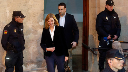 Spain's Princess Cristina, daughter of King Juan Carlos, leaves a courthouse after testifying in front of judge Jose Castro over tax fraud and money-laundering charges in Palma de Mallorca February 8, 2014 (Reuters / Albert Gea)