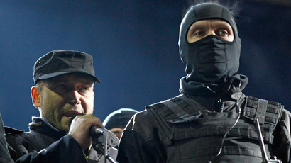 ARCHIVE PHOTO: Dmytro Yarosh (L), a leader of the Right Sector movement, addresses during a rally in central Independence Square in Kiev February 21, 2014 (Reuters / David Mdzinarishvili)