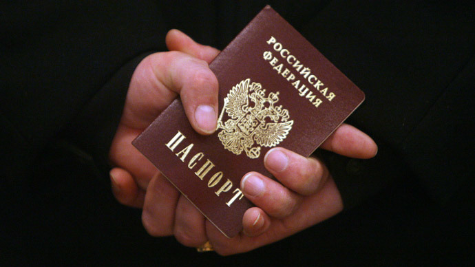 First passports handed out to new Russian citizens in Crimea