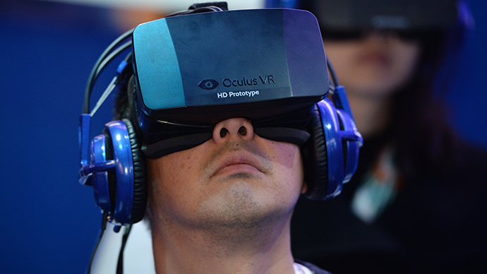 An attendee wears an Oculus Rift HD virtual reality head-mounted display (AFP Photo / Robyn Beck)