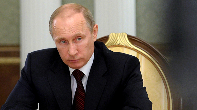 Russia's President Vladimir Putin attends a session of the Supreme Eurasian Economic Council in Minsk, on April 29, 2014. (AFP Photo / Alexey Druzhinin)