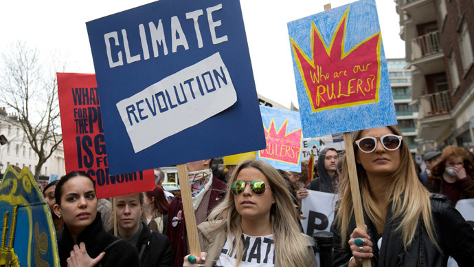 Demonstrators hold placards during an anti-fracking protest in central London March 19, 2014.(Reuters / Neil Hall)