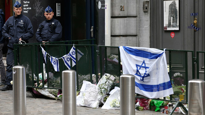 Hollande vows to battle homecoming jihadists as Brussels shooting suspect detained