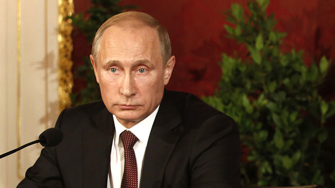Russian President Vladimir Putin attends a joint press conference with his Austrian counterpart in Vienna on June 24, 2014. (AFP Photo / Dieter Nagl)